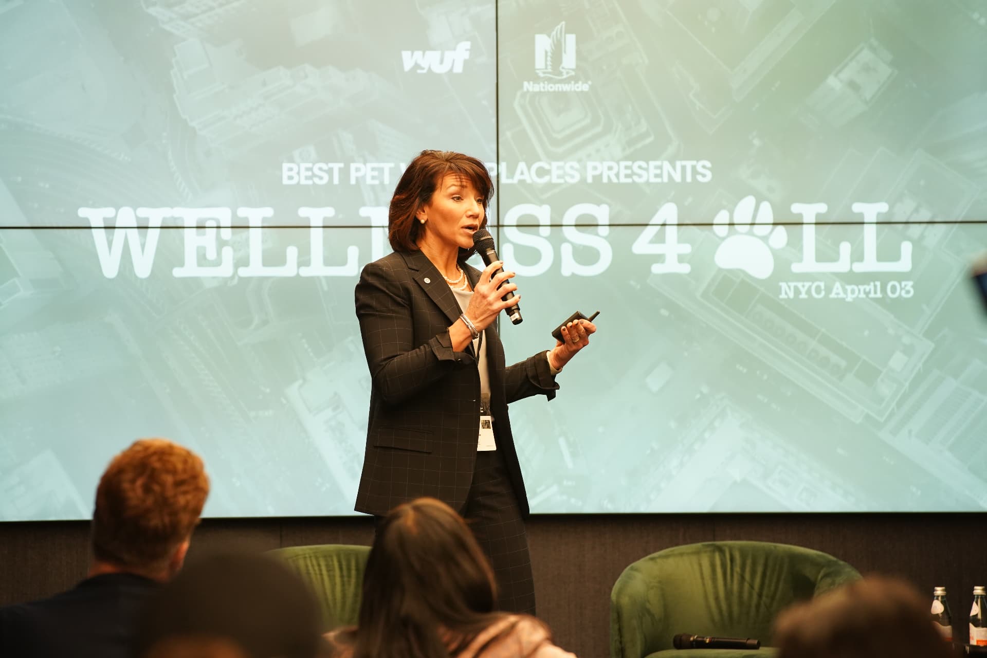 Executive presenting the Wellness 4 All keynote in NYC