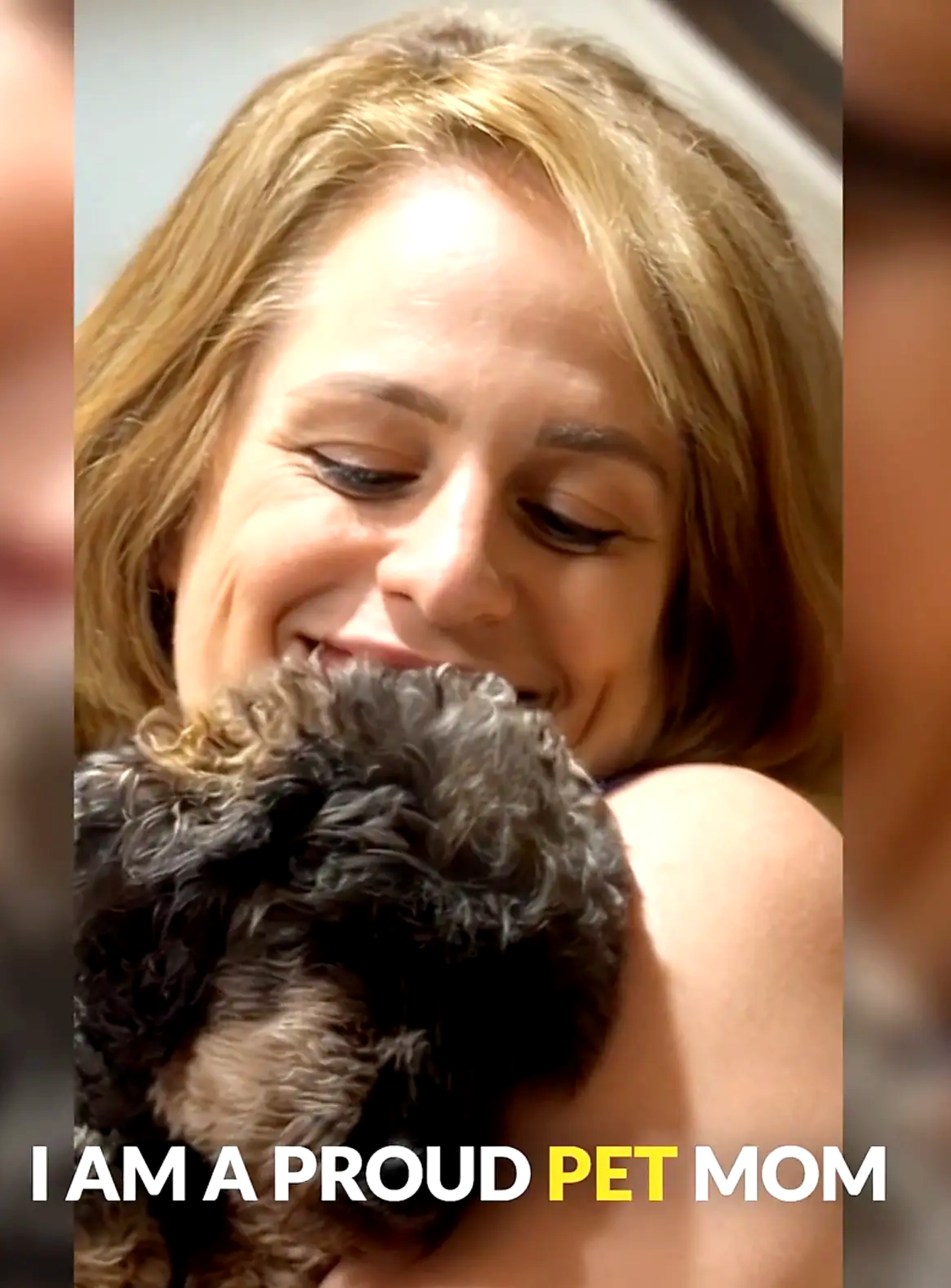 Crunch Fitness employee hugging her dog