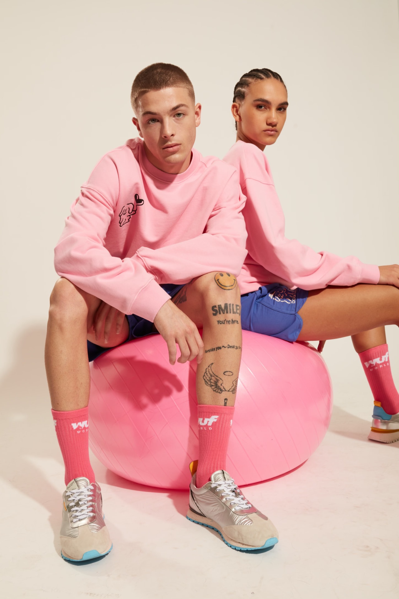 Studio look, pink crewnecks, WUF socks, silver runners